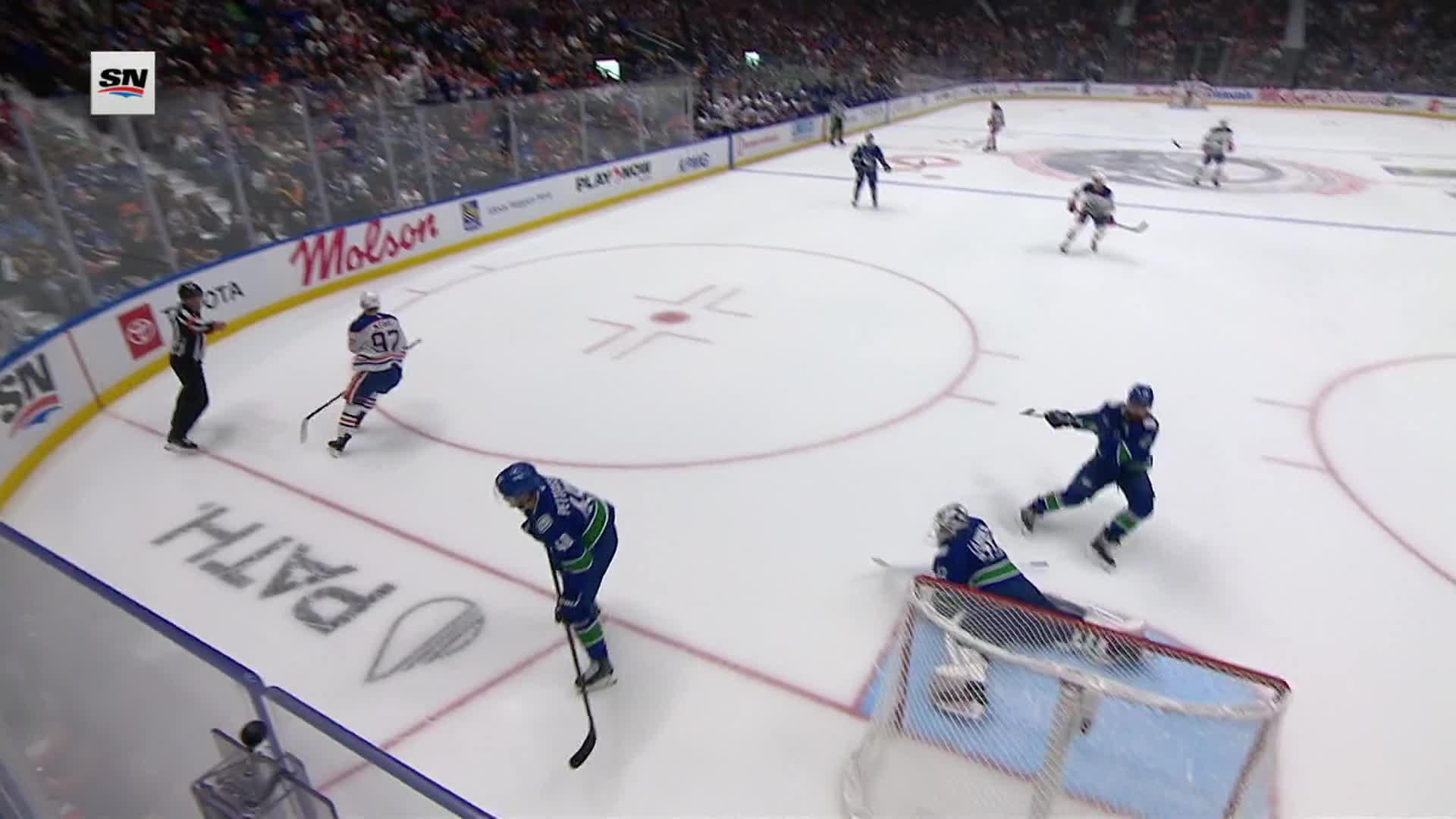 Eight Points in Two Games: Evan Bouchard Makes History as Edmonton Outlasts Vancouver 9-7